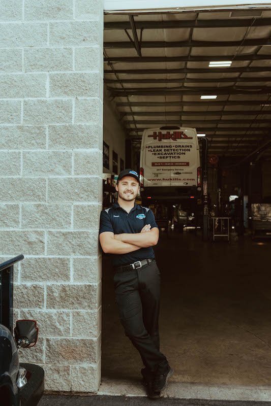 Blueline Automotive employee standing in the shop
